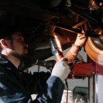 mechanic-inspecting-car